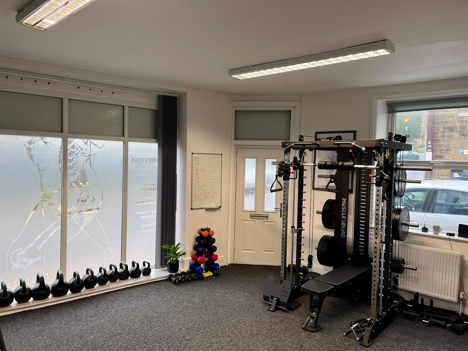 Private personal training studio in Bradford with kettlebells and a power rack